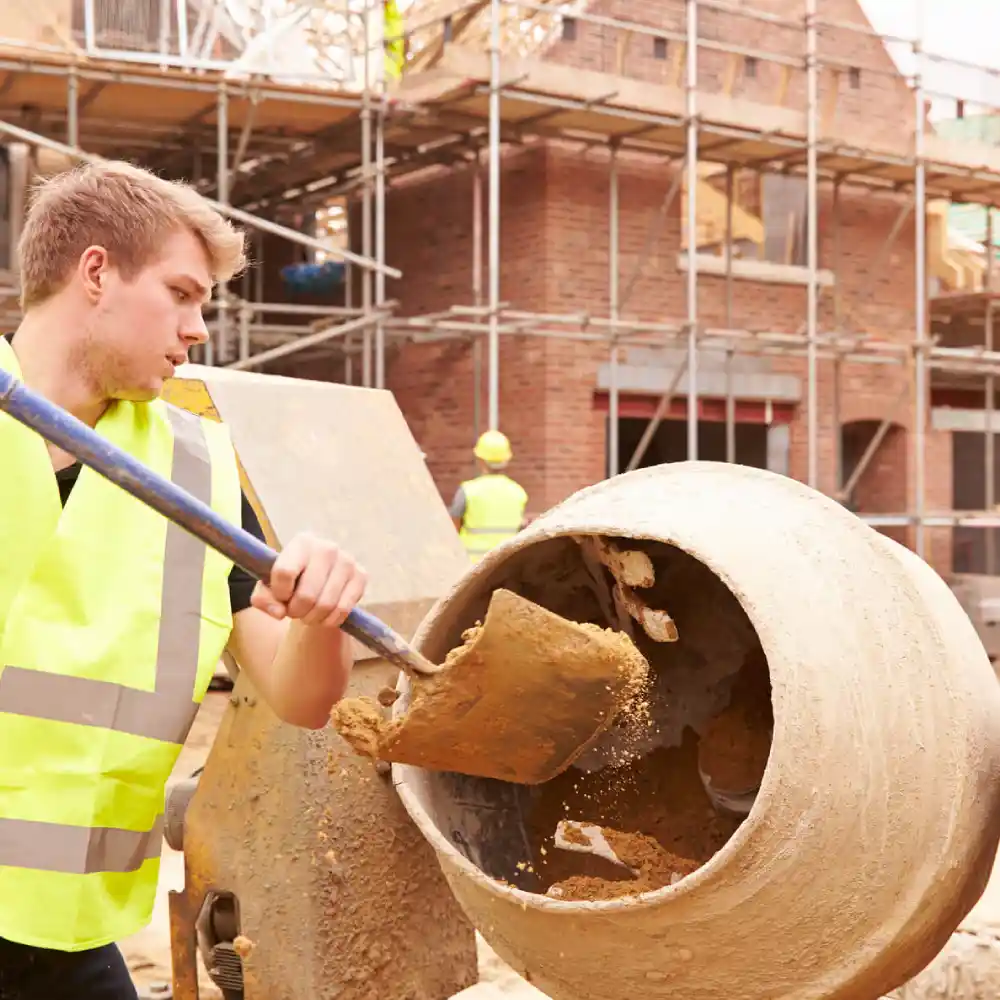 Trades Websites in Manchester - Builder Mixing Cement