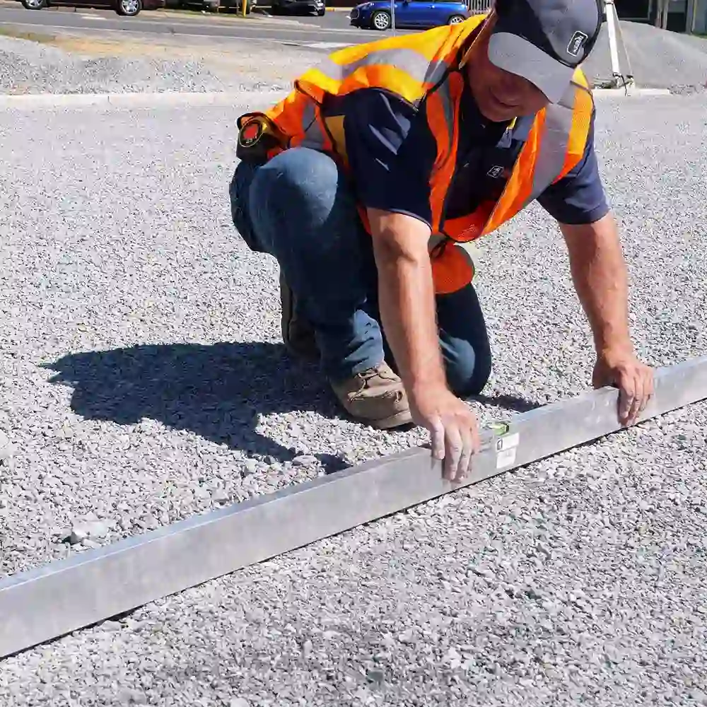 driveway paver levelling the ground - websites for trades